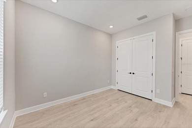 One or more photo(s) has been virtually staged on Esplanade Golf and Country at Lakewood Ranch in Florida - for sale on GolfHomes.com, golf home, golf lot