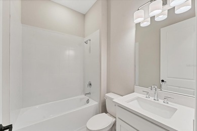 One or more photo(s) has been virtually staged on Esplanade Golf and Country at Lakewood Ranch in Florida - for sale on GolfHomes.com, golf home, golf lot