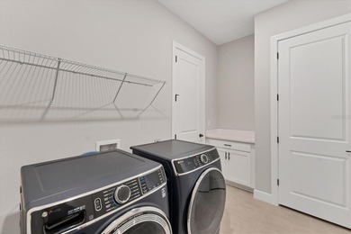 One or more photo(s) has been virtually staged on Esplanade Golf and Country at Lakewood Ranch in Florida - for sale on GolfHomes.com, golf home, golf lot