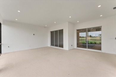 One or more photo(s) has been virtually staged on Esplanade Golf and Country at Lakewood Ranch in Florida - for sale on GolfHomes.com, golf home, golf lot