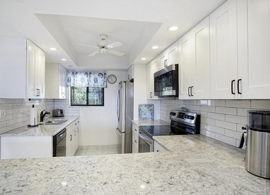 Gorgeous 4th floor 2 bed/2 bath unit features a beautiful quiet on Ocean Village Golf Course in Florida - for sale on GolfHomes.com, golf home, golf lot