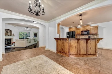 Tucked into the trees on a quiet Bella Vista street, this on Bella Vista - Metfield Golf Complex and Country Club in Arkansas - for sale on GolfHomes.com, golf home, golf lot
