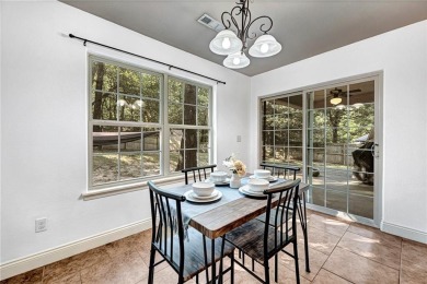 Tucked into the trees on a quiet Bella Vista street, this on Bella Vista - Metfield Golf Complex and Country Club in Arkansas - for sale on GolfHomes.com, golf home, golf lot