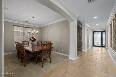 This expansive 5-bedroom, 3-bath home offers over 4,100 square on The Golf Club At Johnson Ranch in Arizona - for sale on GolfHomes.com, golf home, golf lot