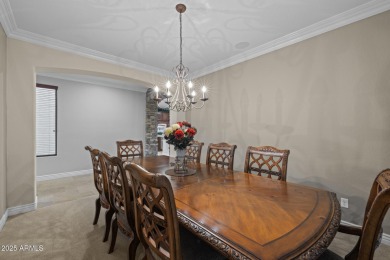 This expansive 5-bedroom, 3-bath home offers over 4,100 square on The Golf Club At Johnson Ranch in Arizona - for sale on GolfHomes.com, golf home, golf lot