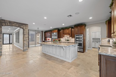 This expansive 5-bedroom, 3-bath home offers over 4,100 square on The Golf Club At Johnson Ranch in Arizona - for sale on GolfHomes.com, golf home, golf lot