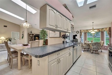 Welcome to this bright and spacious Oakmont villa located in the on Timber Pines Golf Course in Florida - for sale on GolfHomes.com, golf home, golf lot