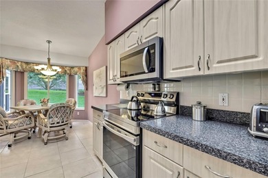 Welcome to this bright and spacious Oakmont villa located in the on Timber Pines Golf Course in Florida - for sale on GolfHomes.com, golf home, golf lot