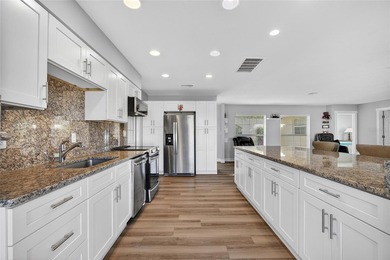 PUNTA GORDA ISLES! PRICED TO SELL 2-BEDROOM, 2-BATH HOME, 2-CAR on Saint Andrews South Golf Club in Florida - for sale on GolfHomes.com, golf home, golf lot