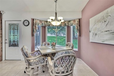 Welcome to this bright and spacious Oakmont villa located in the on Timber Pines Golf Course in Florida - for sale on GolfHomes.com, golf home, golf lot