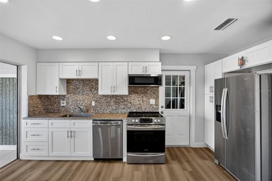 PUNTA GORDA ISLES! PRICED TO SELL 2-BEDROOM, 2-BATH HOME, 2-CAR on Saint Andrews South Golf Club in Florida - for sale on GolfHomes.com, golf home, golf lot