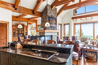 This exceptional 4-bedroom, 5-bathroom mountain retreat offers on Raven Golf Club At Three Peaks in Colorado - for sale on GolfHomes.com, golf home, golf lot