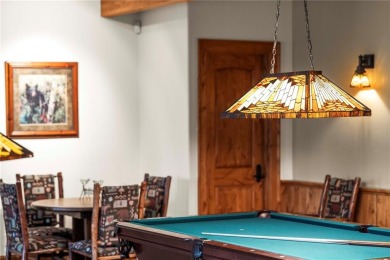This exceptional 4-bedroom, 5-bathroom mountain retreat offers on Raven Golf Club At Three Peaks in Colorado - for sale on GolfHomes.com, golf home, golf lot