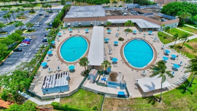 Beautifully remodeled 2 bedroom/2 bath first floor corner unit on Kings Point Golf - Executive in Florida - for sale on GolfHomes.com, golf home, golf lot