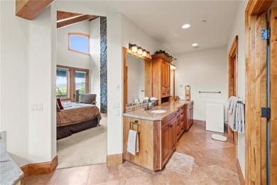 This exceptional 4-bedroom, 5-bathroom mountain retreat offers on Raven Golf Club At Three Peaks in Colorado - for sale on GolfHomes.com, golf home, golf lot
