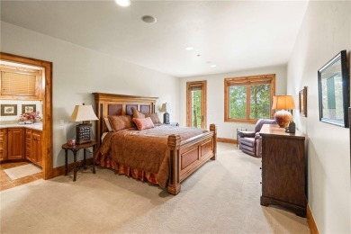 This exceptional 4-bedroom, 5-bathroom mountain retreat offers on Raven Golf Club At Three Peaks in Colorado - for sale on GolfHomes.com, golf home, golf lot