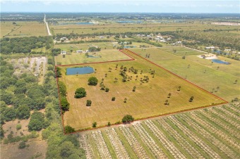Enjoy Country Living Close to the City! Buildable acreage in on Quail Valley Golf Club in Florida - for sale on GolfHomes.com, golf home, golf lot