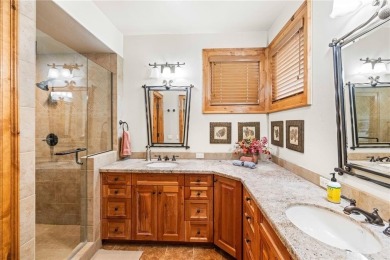 This exceptional 4-bedroom, 5-bathroom mountain retreat offers on Raven Golf Club At Three Peaks in Colorado - for sale on GolfHomes.com, golf home, golf lot