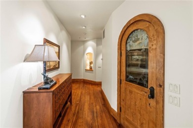 This exceptional 4-bedroom, 5-bathroom mountain retreat offers on Raven Golf Club At Three Peaks in Colorado - for sale on GolfHomes.com, golf home, golf lot