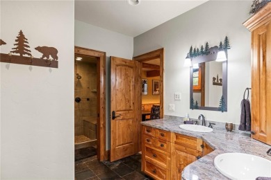 This exceptional 4-bedroom, 5-bathroom mountain retreat offers on Raven Golf Club At Three Peaks in Colorado - for sale on GolfHomes.com, golf home, golf lot