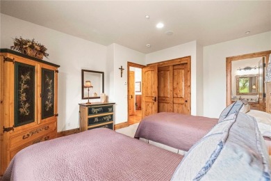 This exceptional 4-bedroom, 5-bathroom mountain retreat offers on Raven Golf Club At Three Peaks in Colorado - for sale on GolfHomes.com, golf home, golf lot