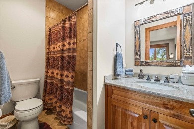 This exceptional 4-bedroom, 5-bathroom mountain retreat offers on Raven Golf Club At Three Peaks in Colorado - for sale on GolfHomes.com, golf home, golf lot