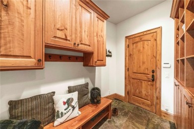 This exceptional 4-bedroom, 5-bathroom mountain retreat offers on Raven Golf Club At Three Peaks in Colorado - for sale on GolfHomes.com, golf home, golf lot