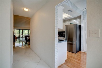 Well-maintained 2nd-floor condo with direct views of the 14th on Boca Delray Golf and Country Club in Florida - for sale on GolfHomes.com, golf home, golf lot