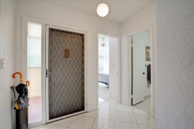 Well-maintained 2nd-floor condo with direct views of the 14th on Boca Delray Golf and Country Club in Florida - for sale on GolfHomes.com, golf home, golf lot
