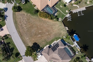 OVERSIZED SAILBOAT-ACCESS LOT ON WIDE CANAL BASIN IN BURNT STORE on Twin Isles Country Club in Florida - for sale on GolfHomes.com, golf home, golf lot