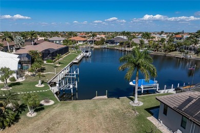 OVERSIZED SAILBOAT-ACCESS LOT ON WIDE CANAL BASIN IN BURNT STORE on Twin Isles Country Club in Florida - for sale on GolfHomes.com, golf home, golf lot