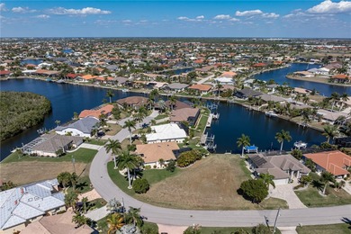 OVERSIZED SAILBOAT-ACCESS LOT ON WIDE CANAL BASIN IN BURNT STORE on Twin Isles Country Club in Florida - for sale on GolfHomes.com, golf home, golf lot