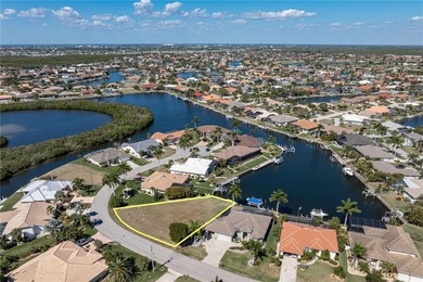 OVERSIZED SAILBOAT-ACCESS LOT ON WIDE CANAL BASIN IN BURNT STORE on Twin Isles Country Club in Florida - for sale on GolfHomes.com, golf home, golf lot