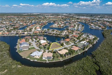 OVERSIZED SAILBOAT-ACCESS LOT ON WIDE CANAL BASIN IN BURNT STORE on Twin Isles Country Club in Florida - for sale on GolfHomes.com, golf home, golf lot