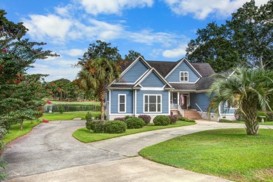 This custom Southern Living-style home sits on a tranquil pond on Santee National Golf Course in South Carolina - for sale on GolfHomes.com, golf home, golf lot