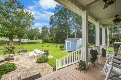 This custom Southern Living-style home sits on a tranquil pond on Santee National Golf Course in South Carolina - for sale on GolfHomes.com, golf home, golf lot