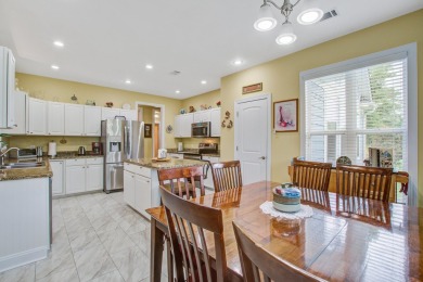 This custom Southern Living-style home sits on a tranquil pond on Santee National Golf Course in South Carolina - for sale on GolfHomes.com, golf home, golf lot