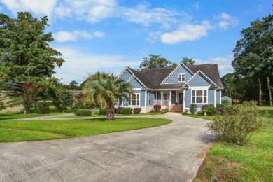 This custom Southern Living-style home sits on a tranquil pond on Santee National Golf Course in South Carolina - for sale on GolfHomes.com, golf home, golf lot