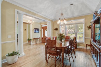 This custom Southern Living-style home sits on a tranquil pond on Santee National Golf Course in South Carolina - for sale on GolfHomes.com, golf home, golf lot