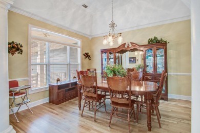 This custom Southern Living-style home sits on a tranquil pond on Santee National Golf Course in South Carolina - for sale on GolfHomes.com, golf home, golf lot