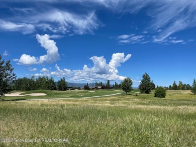 Enjoy the breathtaking Idaho sunsets from the back of this 3/4 on Teton Springs Resort and Club in Idaho - for sale on GolfHomes.com, golf home, golf lot