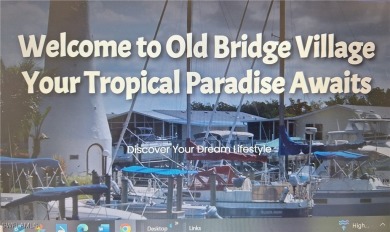 WATERFRONT COMMUNITY - MEMBERSHIP SHARE INCLUDED - AMAZING PRICE on Riverbend Golf and Country Club in Florida - for sale on GolfHomes.com, golf home, golf lot