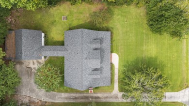 Welcome to 50 Ballard Place, a stunning home situated on over on Wedgefield Plantation Golf Club in South Carolina - for sale on GolfHomes.com, golf home, golf lot