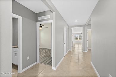 Welcome to this beautifully maintained 4 bedroom, 2 bath on Halifax Plantation Golf Club in Florida - for sale on GolfHomes.com, golf home, golf lot