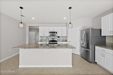 Welcome to this beautifully maintained 4 bedroom, 2 bath on Halifax Plantation Golf Club in Florida - for sale on GolfHomes.com, golf home, golf lot