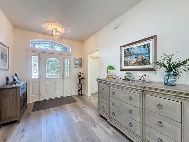 Fabulous St Regis model with  2.5 car garage located on The on Kings Ridge Golf Club in Florida - for sale on GolfHomes.com, golf home, golf lot