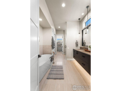 Step into this brand-new paired ranch home at Morning Song on Harmony Golf Club in Colorado - for sale on GolfHomes.com, golf home, golf lot