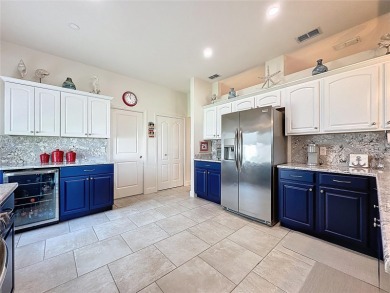 Fabulous St Regis model with  2.5 car garage located on The on Kings Ridge Golf Club in Florida - for sale on GolfHomes.com, golf home, golf lot