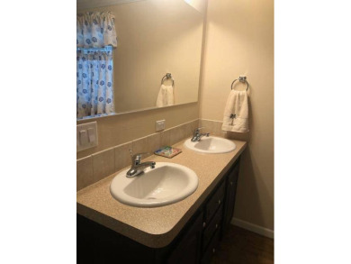 CYPRESS CREEK VILLAGE #287 - 2 BED + DEN / 2 BATH / 1,647 SF. / on Cypresswood Golf and Country Club in Florida - for sale on GolfHomes.com, golf home, golf lot