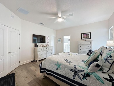 Fabulous St Regis model with  2.5 car garage located on The on Kings Ridge Golf Club in Florida - for sale on GolfHomes.com, golf home, golf lot
